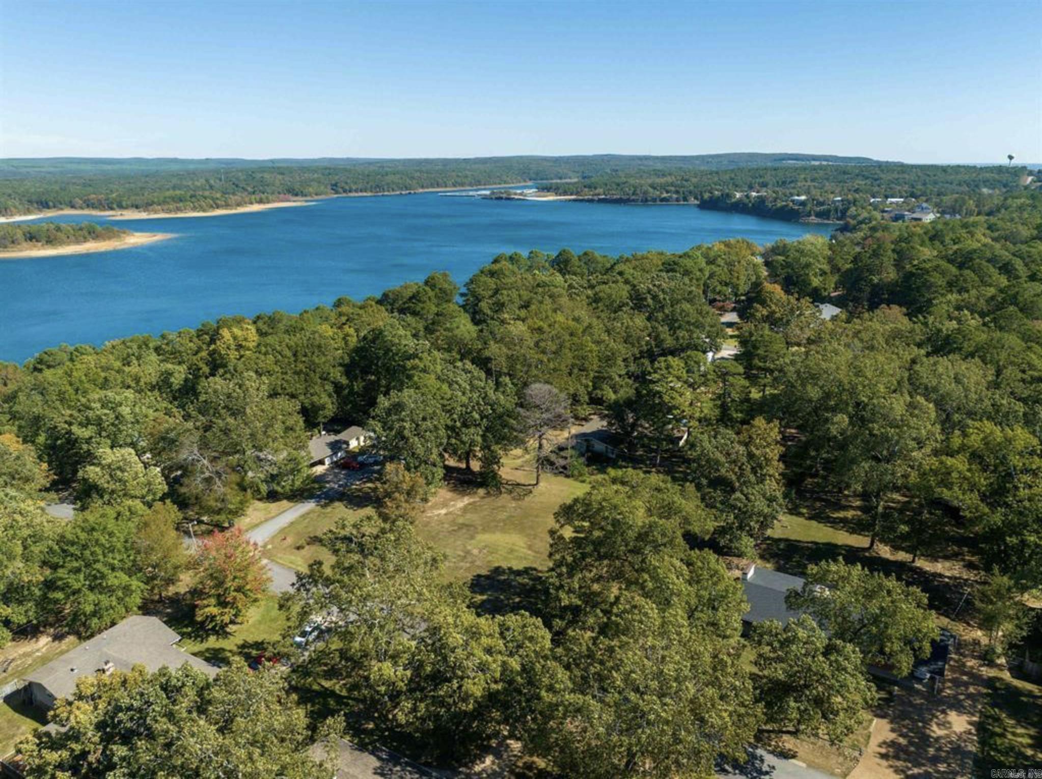 Don’t miss this rare opportunity to own .67 acres of beautiful land located in the heart of Heber Springs! This corner lot offers the perfect blend of privacy and convenience—just minutes from downtown and right down the street from Greers Ferry Lake. Whether you’re looking to build your dream home, a weekend retreat, or a smart investment, this location checks all the boxes. Enjoy easy access to shopping, dining, schools, and endless outdoor recreation.