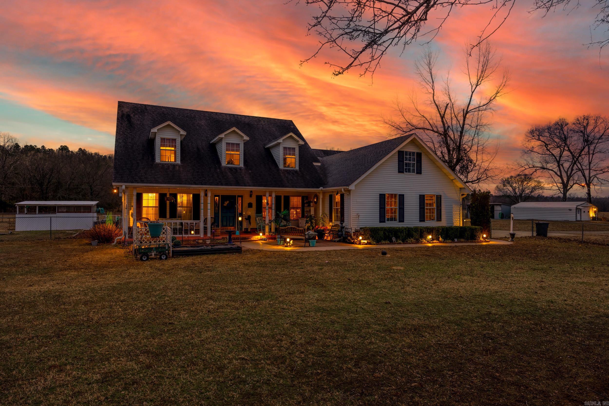 Peaceful 10-Acre Retreat with Pool & Workshop This spacious 3,300 sq. ft. two-story home offers 4 bedrooms, 3.5 baths, and abundant storage in a serene country setting. The upgraded kitchen features granite countertops, a walk-in pantry, and a new picture window. A cozy sitting room boasts built-ins and a wood-burning fireplace with a ducted blower. The primary suite includes a walk-in tiled shower, antique clawfoot tub, and walk-in closet. Two bedrooms share a Jack-and-Jill bath, while upstairs features a large family room, guest suite, and oversized storage room. Outside, enjoy a workshop, lean-to, chicken pen, fenced pastures, and three garden areas. Relax by the in-ground pool, with a new liner, pump, and cover. Recent upgrades include new windows along the south side and a culvert drain. A perfect blend of space, charm, and functionality!