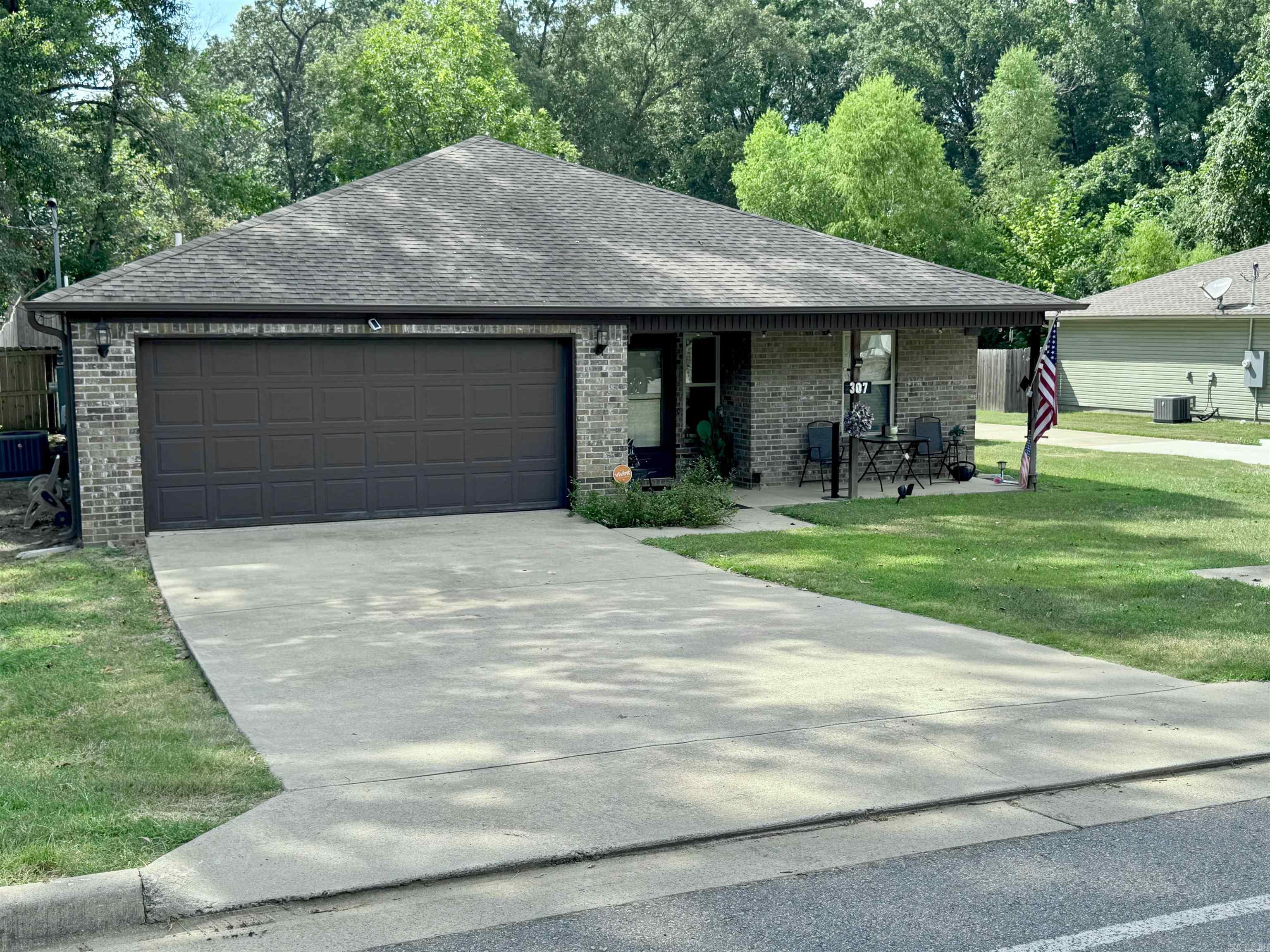 Beautifully maintained 4-bedroom, 2-bath home featuring a spacious, open layout and quality finishes throughout. The interior boasts granite countertops, wood cabinetry, and crown molding, complemented by ample closet space. A combination of hardwood, carpet, and tile flooring adds warmth and style. Enjoy the fully fenced backyard with a patio, perfect for outdoor living. This home is located in the Benton School District and will be sold as-is.