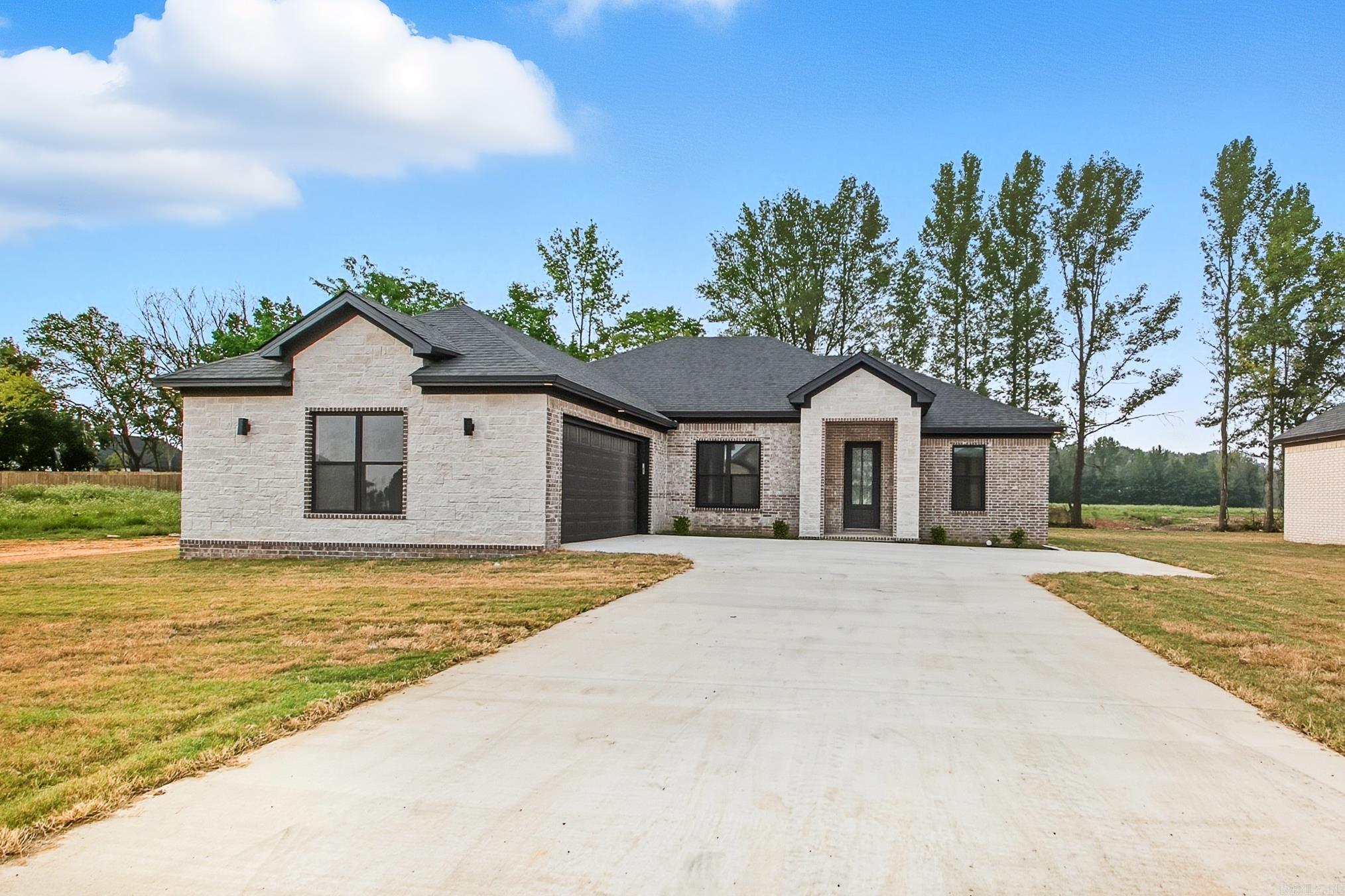 New construction in Copper Moon Estates! This 4 bed, 2 bath, 1,780 sq ft home offers modern upgrades & energy-efficient features to keep utility costs low. Open floor plan w/tall ceilings, crown molding & formal entry. Luxury vinyl flooring throughout (no carpet). Spacious kitchen w/granite countertops, breakfast bar, & stainless appliances opens to living area w/cozy wood-burning fireplace. Primary suite features a walk-in shower, dual vanity, & oversized closet. Energy-efficient details include the walls being spray foam insulated, air duct foam insulated, Low-E windows, radiant barrier roof, & higher efficiency air conditioning. Exterior boasts a fully fenced backyard w/covered patio, perfect for entertaining, plus a 2-car garage. Located on a .31-acre lot in the Cabot School District, near schools, shopping, amenities, & just minutes from Hwy 38 for easy commuting. Also includes builder’s 1-year warranty. Schedule your showing today. Don’t miss your chance to call this beautiful new home yours!