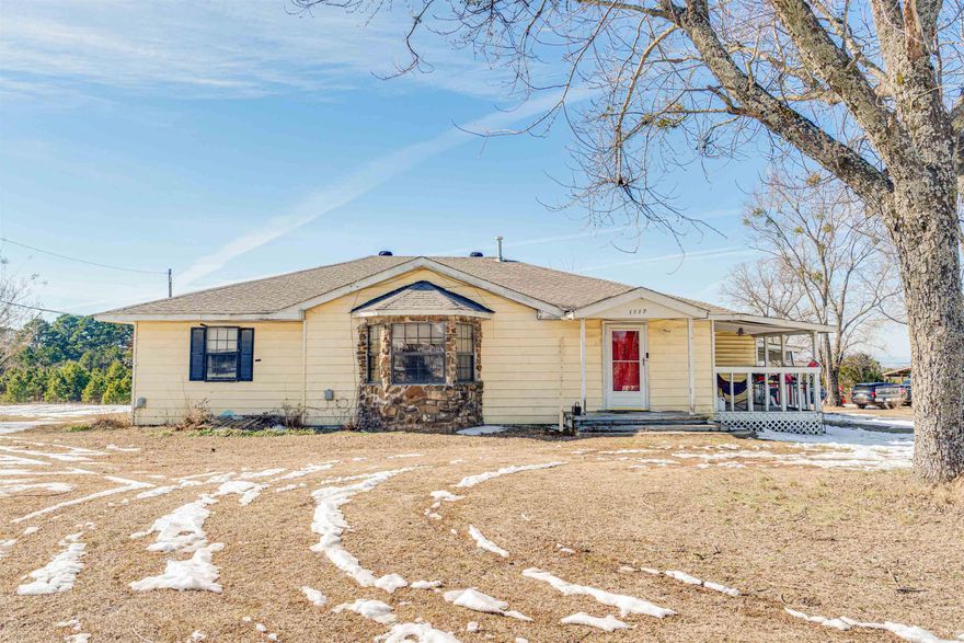 Scenic mountain views and peaceful country living on 6 acres of land! This charming 3-bedroom home is perfect for homesteaders and nature enthusiasts. Located just 2.5 miles from the Ozark National forest and 25 minutes from I-40 and the conveniences of Morrilton, this property features multiple outbuildings for storage or small livestock, and a fenced in back yard. You'll love the beautiful views of the Ozark foothills right outside your front door. The owners will be doing some updates on the flooring in the home, and should qualify FHA/RD/VA when finished. Lots of land and no restrictions- the possibilities are endless! This home can be purchased alone, or along with 1119 Granny Hollow Road, giving you an opportunity to own 2 3b/2b homes potentially generating rental income and would total 10 acres of land. Agents, please see remarks for scheduling.