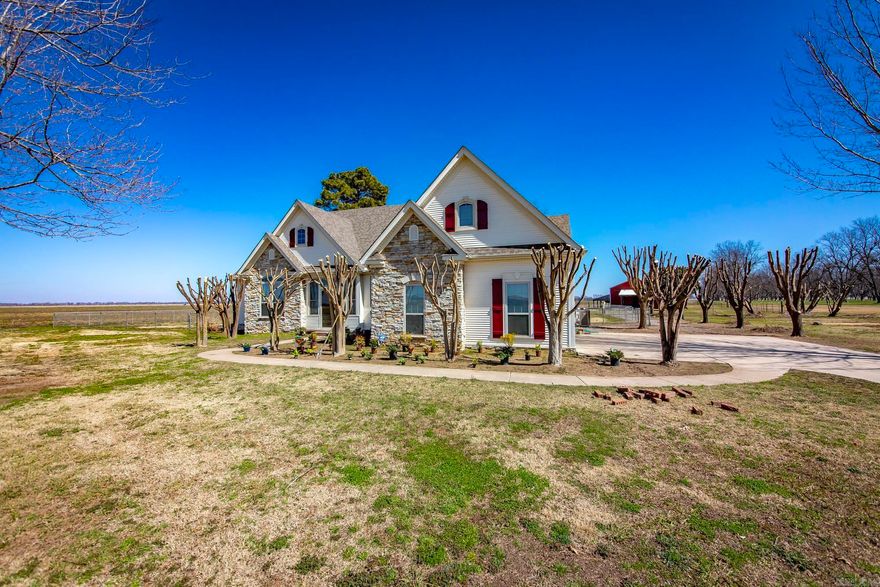 This is a custom-built home on 5.75 acres.  Neoclassical in style, it has bright open style with beautiful windows and arched interior doors.  It contains 3 bedrooms, 2.5 baths, Formal dining, kitchen and great room.  Upstairs you will find flex space for game room, hobby room or whatever you want.  Enclosed Porch, Sunroom, and Wood Deck. Outside you find a pasture and insulated barn.  Anxious to show this beautiful home.