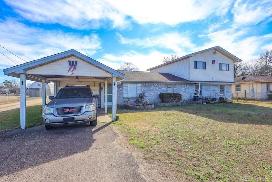 A Rare Diamond in the Rough: In-Town Acreage with Shop, Ponds & Live/Work Potential – Murfreesboro  Located within the city limits of Murfreesboro with Main Street frontage, this unique property shines with space and flexibility on approximately 3.15 level acres. The 2,676± sq ft all-electric home offers 5 bedrooms and 2 bathrooms, including a fifth-bedroom upstairs suite currently tenant-occupied.  The outdoor setting truly sparkles with two small ponds, an expansive shop, and an additional storage building—ideal for hobbies, equipment, or projects. A separate guest home/apartment is also located on the property and is in need of restoration, offering future potential for guest quarters, a private office, or additional living space.  Just minutes from the Crater of Diamonds State Park, downtown Murfreesboro, local schools, shopping, and a short drive to Lake Greeson and the Little Missouri River, this property combines in-town convenience with room to spread out. Well suited for a live/work setup, home-based business, or a buyer seeking land and versatility close to local attractions, this is a true Murfreesboro gem—opportunities like this are incre