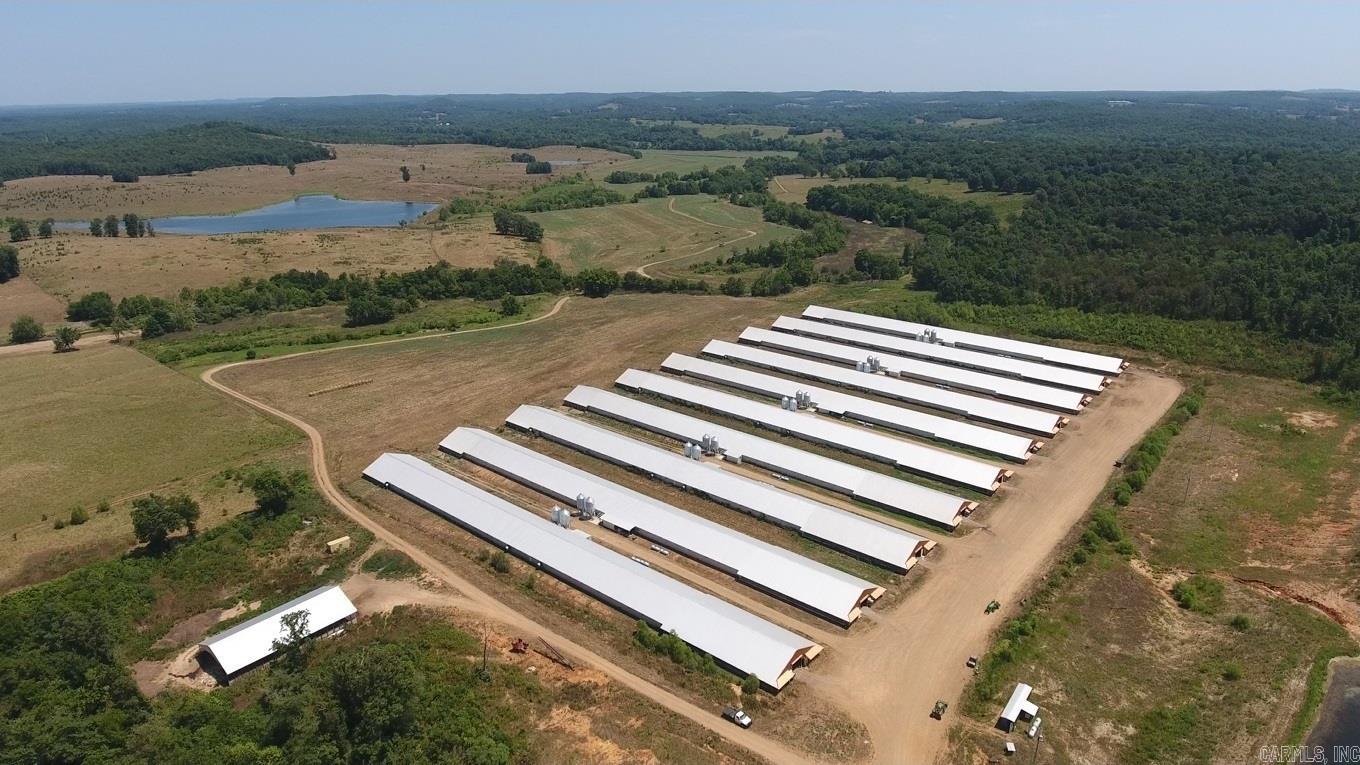 This 40 acre m/l poultry farm in Arkansas and includes 10 newer chicken houses, 3 bedroom 2 bath double wide, 1 bedroom 1 bath apartment, and much more.