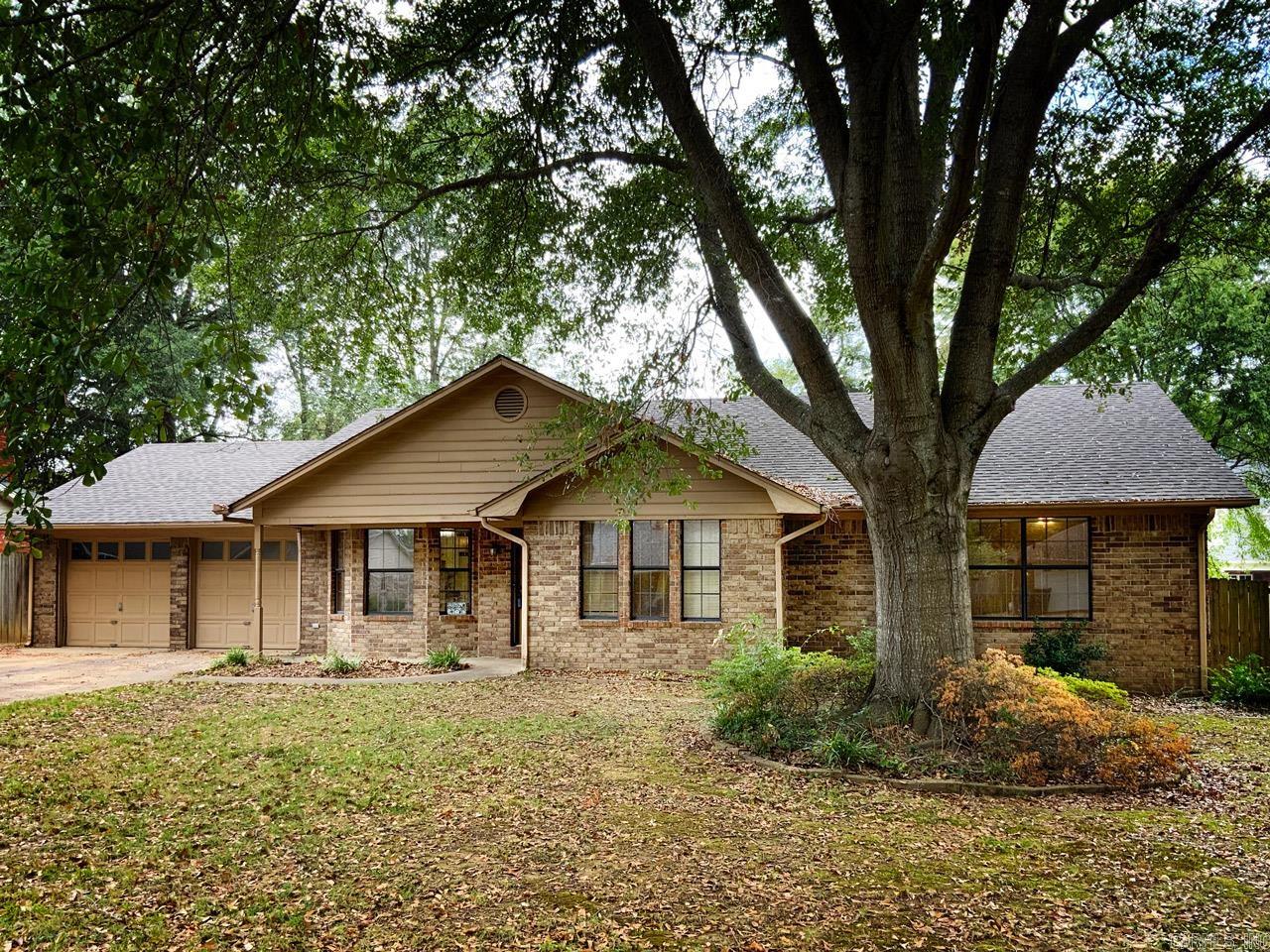 Explore this great area of Conway with so many amenities! Right in the midst of them, this delightful home is nestled on a quiet neighborhood loop. The family room boasts built-in bookshelves, cabinets and a fireplace, overlooking the big back yard. While the formal dining room gives a view of the lovely neighborbood, the breakfast room looks out onto the back yard. Enjoy the convenience of more storage, including an extra room (shop, craft, sewing?) off the 2-car garage and a large laundry room with plenty of cabinets. The shaded backyard offers ample playroom for kids or pets. With quick access to groceries, restaurants, and shopping, plus a short commute to UCA and Conway Regional Medical Center, this home ensures a functional and well-connected lifestyle. TLC is needed, therefore we are offering it "as is", There is new paint in most of the interior.