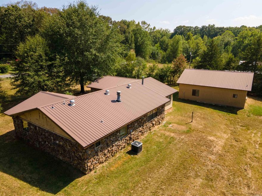 If you're in the market for a spacious home on a beautiful piece of land, look no further! This house, built around 1980, offers approximately 1780 square feet of comfortable living space. With its convenient location just a few minutes outside Danville, you'll enjoy easy access to nearby towns like Dardanelle and Russellville via Highway 27. Inside the house, you'll find three bedrooms and two bathrooms, ensuring plenty of space for your family. The full kitchen is equipped with all the necessities, making meal preparations a breeze. The central heat and air provide year-round comfort, while the Belleville City water keeps your faucets flowing smoothly. But that's not all! Located on the property is a studio apartment. Outside, the 18.44-acre property is fenced with a chain link fence