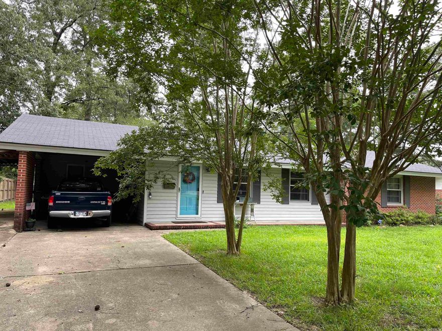 Kitchen remodeled with new cabinets and appliances, new flooring, paint, new deck.