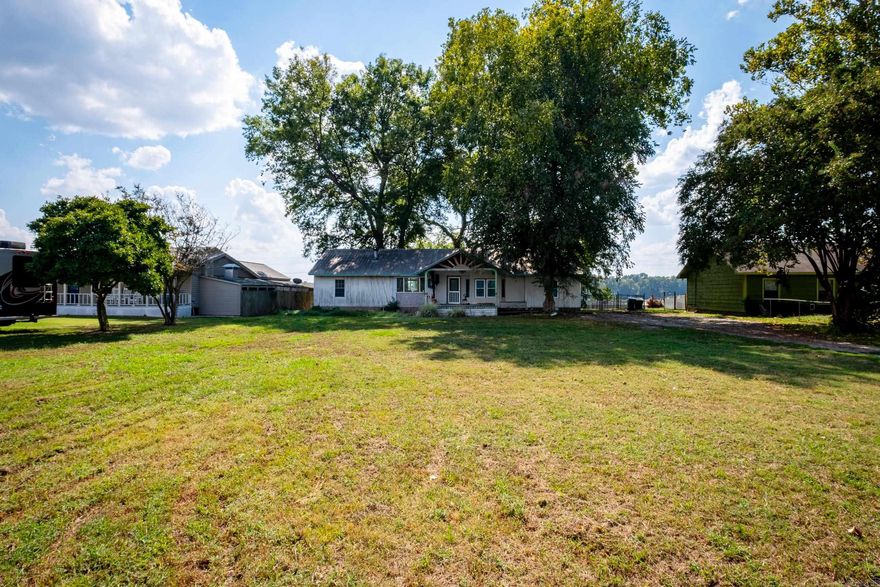 Charming Riverfront Mobile Home on Half-Acre Lot   Welcome to your serene riverside retreat! This mobile home is nestled on a generous half-acre lot, offering a picturesque view of the tranquil Old River. With its own private dock, this property is a water lover's dream come true.  Key Features: *Breathtaking River View: Wake up to the soothing sights and sounds of the river every day. *Private Dock: Enjoy easy access to boating, fishing, and water activities from your very own dock. *Spacious Half-Acre Lot: Plenty of room for gardening, outdoor gatherings, and more. *Flat and Beautiful Land: Perfect for outdoor enthusiasts and nature lovers. *Serenity and Seclusion: Escape the hustle and bustle while being just a short drive from town.  Whether you're looking for a peaceful weekend getaway or a permanent waterside residence, this property offers the ideal combination of natural beauty and convenience. Don't miss the chance to make this riverfront gem your own!  Home is being sold as is- needs some TLC