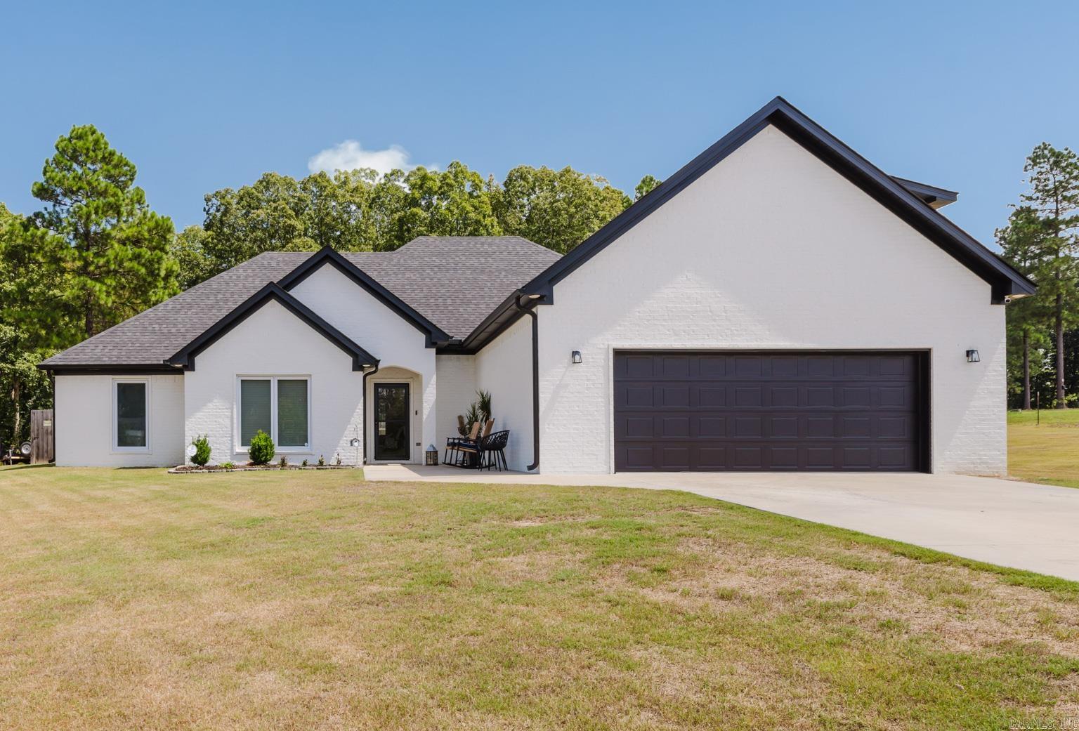 Come check out this gorgeous 4 bedroom 3 bath home on almost 2.5 acres! This home features marble counter tops in the kitchen and a beautiful covered patio that leads to the deck surrounding the pool. At the back of the property there is a trail through the woods to ride your dirt bikes and four wheelers which can be stored in the 10x20 shop with a roll up door! This property has more to offer than can be listed here. Agents see remarks