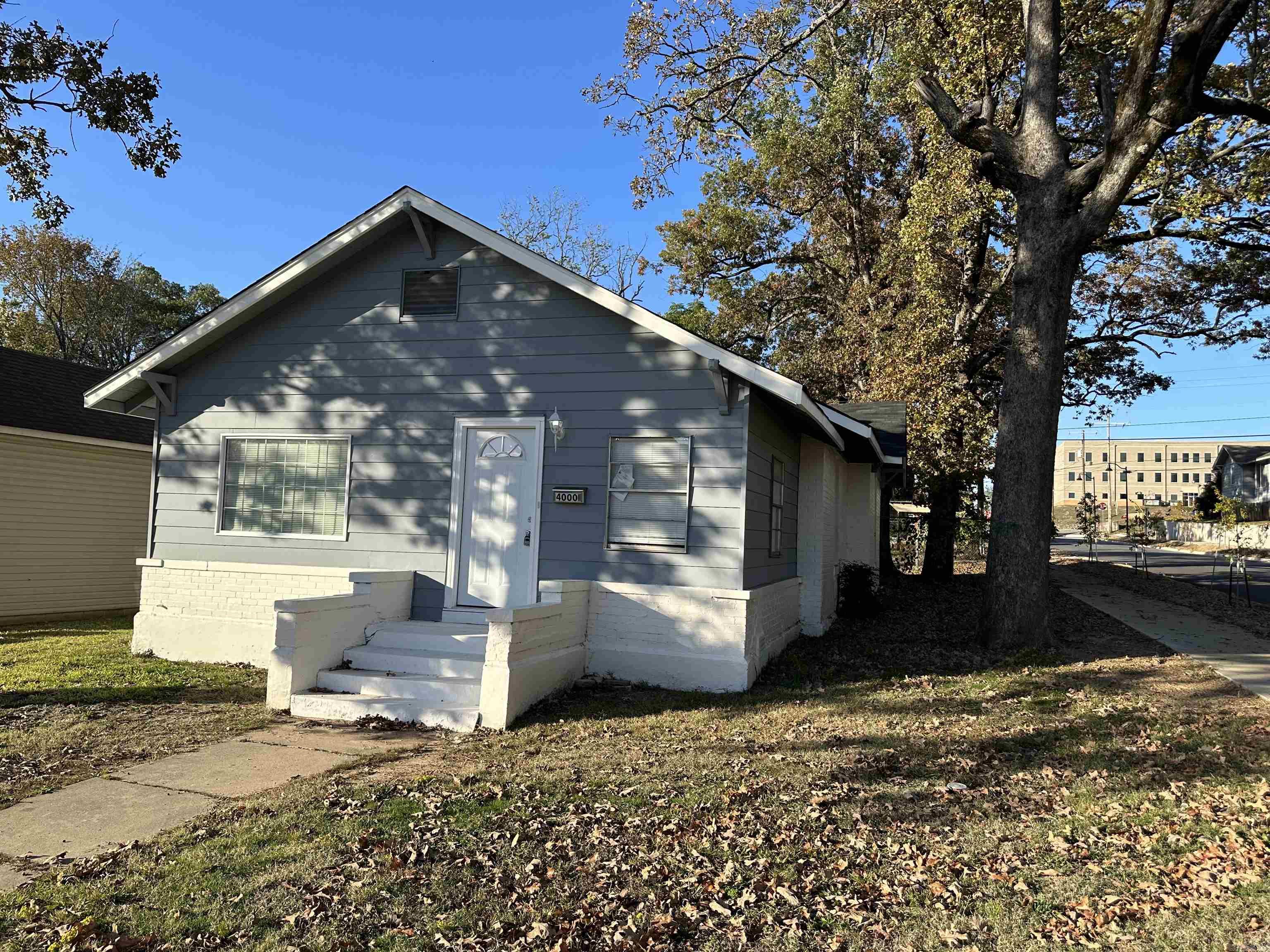 This recently renovated 3-bedroom, 1-bathroom home is ideally situated near UALR and hospitals, offering both convenience and a fresh, modern living environment. The property boasts a brand-new kitchen, bathroom, flooring, fixtures, and paint, making it move-in ready. It also provides a separate office space, distinct living and dining areas, and a unique feature of one bedroom being isolated from the other two. With the added convenience of rear parking, this home is an attractive option for those seeking an updated and well-located residence.