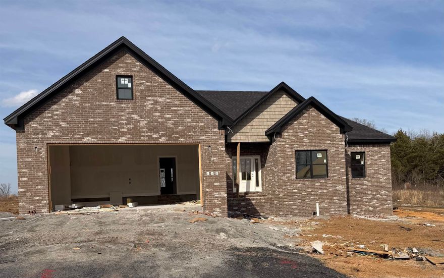 Beautiful new construction home in Hidden Valley Estates! Next Gen waterproof floating wood floors throughout with tile in bathrooms and laundry, granite/quartz countertops, custom island, vent hood, shelves, and beams, custom cabinets to the ceiling with large hidden pantry, vaulted ceiling, custom trim, custom tiled shower, his and her closets and his/her vanities in master, large covered back porch and tons more. Interior pictures are of previous home just to give idea of finishes. Finishes will vary and will be identical to these photos. Estimated completion April 2026