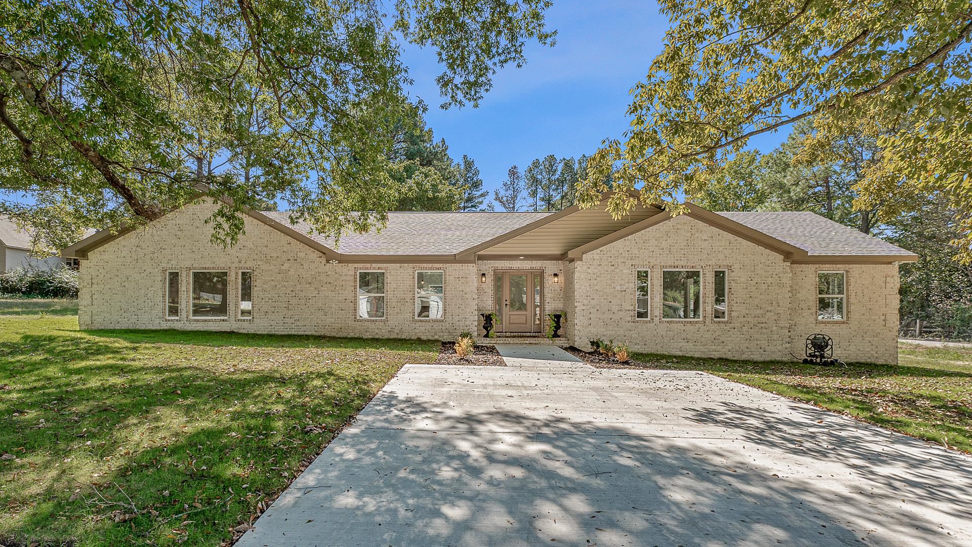 Beautiful Home in a Great Location! This totally remodeled 2,408 sq/ft all brick, must see home sits on a corner lot in Harrisburg. The large living area with vaulted ceilings and a fireplace is open to the kitchen and dining area. With four bedrooms, two bathrooms, tile showers, quartz countertops in the kitchen, large laundry room and mud room. NEW roof, HVAC, water heater, appliances, flooring, fixtures, paint and much more makes this home move in ready!