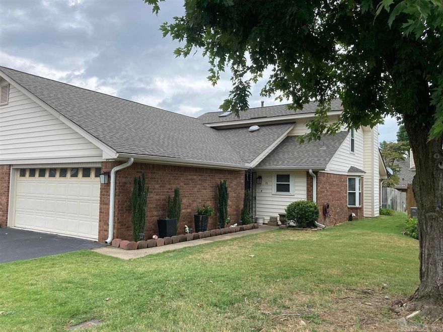 Charming, well-maintained 3-bedroom 2 bath, Dark Forest condo conveniently located near I-30, shopping, and entertainment! This home has a spacious living/dining combo plus extra room perfect for private dining or an office. Enjoy a 2-car garage and covered patio with a fenced concrete backyard. Great community amenities include a gazebo, picnic area, and RV/boat parking. POA dues cover exterior, grounds, termite contract, and trash pickup. Don't miss this one!