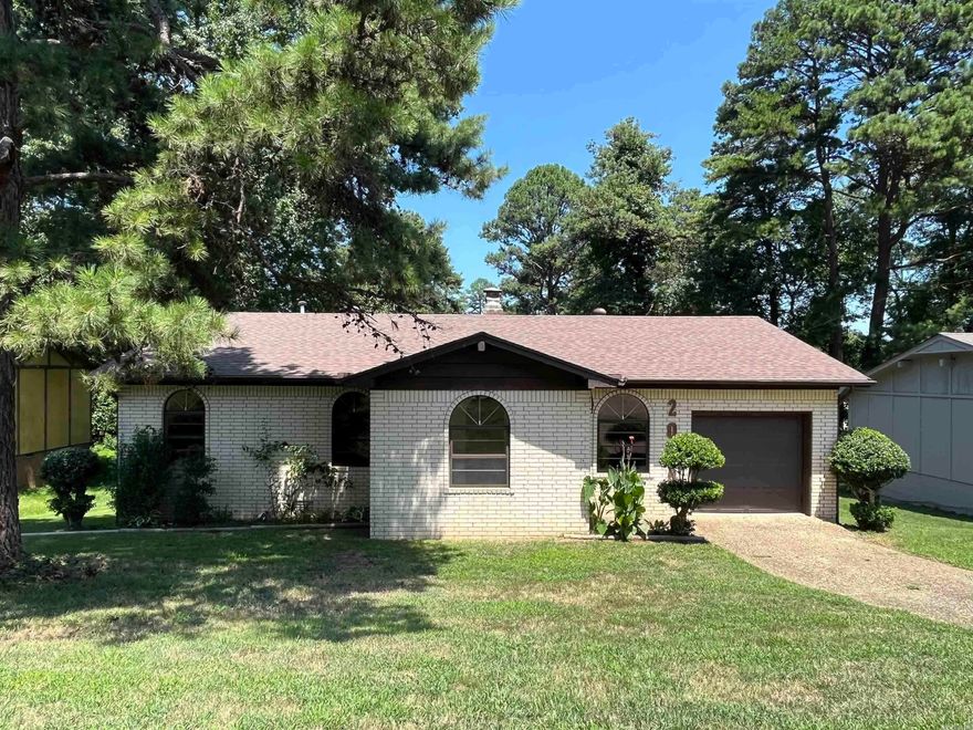 Charming brick and frame home featuring 3 spacious bedrooms and a thoughtfully designed layout.  The large kitchen offers abundant cabinet space, perfect for storage and meal preparation.  Enjoy cozy evenings by the wood-burning fireplace or entertain guests on the expansive back deck overlooking a large backyard with mature fruit trees.  Additional highlights include an extra large laundry room that could be utilized as an office space, a one-car garage, newer roof and a recently installed HVAC system with updated ductwork for improved efficiency and comfort.  Conveniently located near schools, shopping, library, local hospitals and interstate, this home offers both comfort and accessibility.  Currently tenant occupied with notice given to tenant. Taxes do not include $600 tax credit.  Loan programs available with 100% financing if you qualify. Photos are from when property was vacant prior to tenant. Minimum 2 hours notice to show.