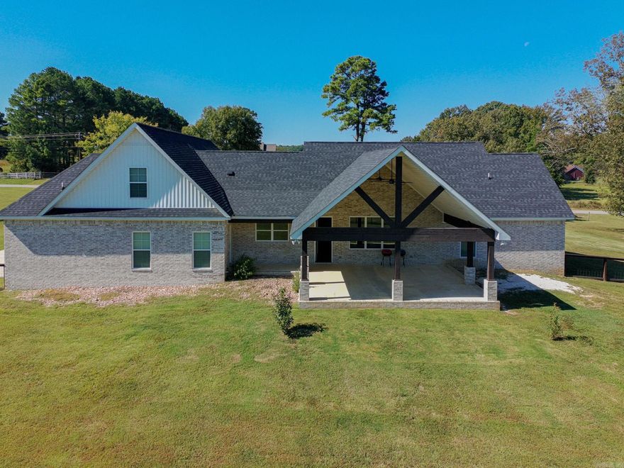 Absolutely gorgeous home located in Brookland School District on 14.19 acres.  Built in 2022, this like new home features an open floor plan with LVP flooring in main areas and quartz countertops in kitchen. Three bedrooms on main level and primary suite includes a private patio entrance and connects to laundry room. On the second level you will find an additional two bedrooms and full bathroom. An extra apartment is located on property.