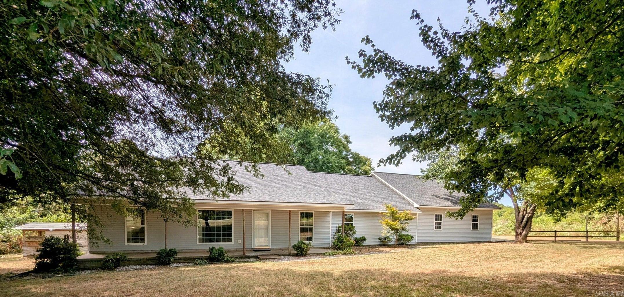 Your Search is over, but you'd better ACT FAST! This NEWLY RENOVATED 2506 SQ ft one-level charming 4 bedroom, 2 bath home features an open concept kitchen/living room, a formal dining room, and a family room. The large 930+ SQ ft. 3-car garage provides abundant space for your cars and storage needs. Nestled on just over an acre of land located only minutes from Batesville, this property offers the peace of rural living with the convenience of being close to town. Enter the home into the inviting living room, featuring cathedral ceilings, neutral tones, and a cozy fireplace. Enjoy cooking and hosting in the kitchen equipped with new granite countertops and new stainless steel appliances. The formal dining room offers views of the backyard and connects to the family room, featuring large windows looking over the beautiful backyard. The primary bedroom is situated apart from the other bedrooms, providing additional privacy. Three of the four bedrooms feature walk-in closets providing plentiful space. The home also boasts a large laundry/mud room.