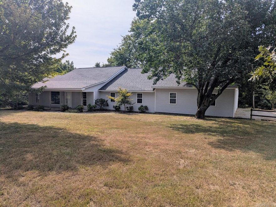 This NEWLY RENOVATED 2506 SQ ft one-level charming 3/4 bedroom, 2 bath home features an open concept kitchen/living room, a formal dining room, and a family room. The large 930+ SQ ft. 3-car garage provides abundant space for your cars and storage needs. Nestled on just over an acre of land located only minutes from Batesville; this property offers the peace of rural living with the convenience of being close to town. Enter the home into the inviting living room, featuring cathedral ceilings, neutral tones, and a cozy fireplace. Enjoy cooking and hosting in the kitchen equipped with new granite countertops and new stainless steel appliances. The formal dining room offers views of the backyard and connects to the family room, featuring large windows looking over the beautiful yard. The primary bedroom is situated apart from the other bedrooms, providing additional space. Three of the four rooms feature walk-in closets providing plentiful space. The home also boasts a large laundry/mud room. Looking for the LOW MAINTENANCE of a newer home without the $$ price tag of a new home this size?  This home has all the big-ticket items taken care of. Property is agent-owned.