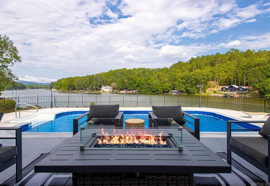 Ahhh, take a deep breath and exhale into relaxation at its finest. This home is fully furnished and professionally decorated to create the best lakefront experience possible. Not only does the 3 BR 2.5 bath main home (2864 SF) have everything you need, the fully appointed guest house and game room (1014SF) has additional BR, full bath, and full kitchen. And let's not forget the peaceful outdoor entertaining area with newly lined pool, extra landscaping with all new sprinkler system, and two stall covered boat dock. Our lakefront listing truly has all you need to experience Lake Hamilton in beautiful Hot Springs, Arkansas. The property is an active short-term rental marketed on overnightdigs.com. Back on market due to previous buyer's contingency sale falling through.
