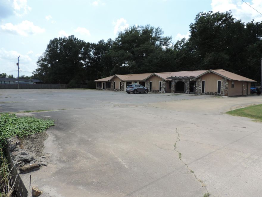 Investment Opportunity – Prime Location in the Heart of Town  Don’t miss this incredible chance to own a well-maintained shopping strip in a high-traffic area. Featuring three separate units and an approx 20,000 sqft parking lot, this property offers endless possibilities for income and business growth.      •    Unit 1: Approximately 1,664 sq. ft. with 5 rooms, 1 bathroom, a laundry room, and a spacious waiting area – ideal for office space, medical, or professional services.     •    Unit 2: Approximately 768 sq. ft., currently occupied by a nail salon with a 5-year lease in place – providing immediate rental income.     •    Unit 3: Approximately 1,280 sq. ft. with 3 rooms, 1 bathroom, and a large waiting room – perfect for retail, salon, or office use. Call today to schedule your personal showing!