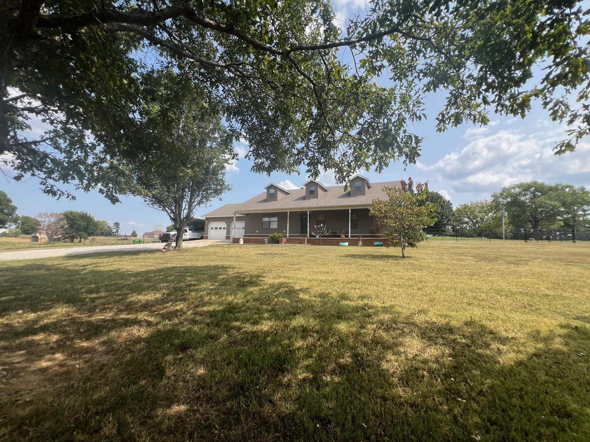 Discover the charm of suburban living in this newly-listed, 3-bedroom, 2-bathroom home nestled in Oak Grove Heights. Built to last, the property features a resilient 40-year roof added in 2018 and robust exterior updates including new siding and gutters (2020), and a secure chain link fence recently installed. The house spans 1884 square feet, providing spacious living with vaulted ceilings in the living room that add a touch of elegance.  Step through to a functional kitchen that opens to a cozy dining area, perfect for your culinary experiments! The primary bedroom offers a comforting retreat after a day’s work. Enjoy the climate-controlled comfort with a 3.5 ton HVAC system installed in 2018.  Step outside to the delightful outdoor space; a back patio paired with a gazebo invites you to enjoy serene evenings or lively weekend gatherings. Plus, never worry about parking with ample space available. This home brings together style, functionality, and comfort, making it a perfect setting for creating lasting memories.