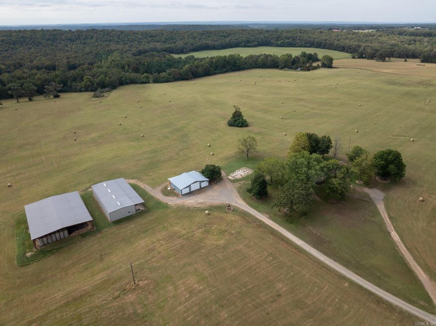 Located in the highly desirable Hwy. 64 / Hwy. 5 corridor—just a short drive from Little Rock and Conway—Resurrection Ranch is the sprawling farm you’ve been searching for.  Currently operating as a long-term, established hay farm, the open ground here is as manicured and well-maintained as you’ll find anywhere. Decades of meticulous care have transformed this property into a true showpiece of both productivity and beauty.  Ample water resources are found throughout, with eight ponds strategically placed across the landscape and Daniels Creek meandering through the southern portion—providing natural charm, dependable water for livestock, and irrigation potential. Utilities, including water and electricity, are readily available.  The property includes a ranch-style home ready for immediate move-in, a large red iron hay barn, an additional barn for hay and equipment storage, and a fully enclosed shop—perfect for farm operations, equipment maintenance, or hobby projects.  Offering approximately 2.25 miles of county road frontage, the ranch provides outstanding access and multiple entry points for operational convenience or future development.  All owned mineral rights will convey.