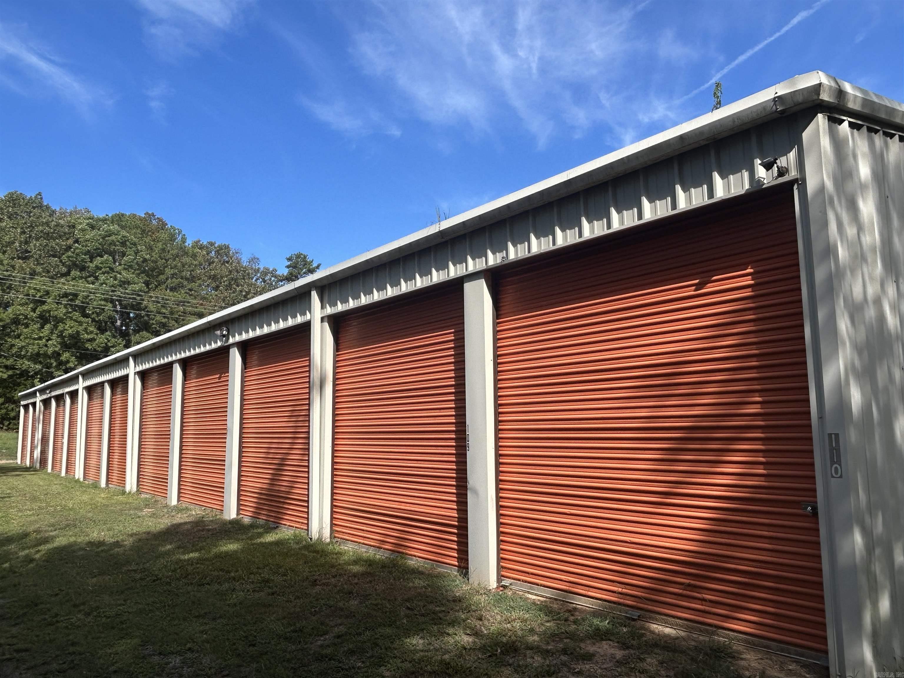 HEBER SPRINGS AREA GOLD MINE!!!!This 88-unit storage facility presents an exceptional business opportunity, strategically located in a high-traffic area near Dam Site Marina. The property features concrete footing, prepped and ready for the construction of an additional boat storage building, offering significant potential for expansion. The facility boasts excellent roofs and is fully operational with full occupancy, ensuring immediate income. Ideal for investors or entrepreneurs looking to capitalize on a thriving market with established demand.
