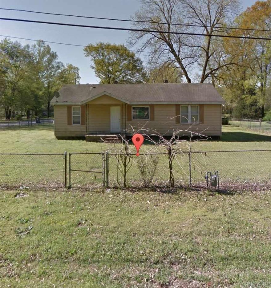 Nice 2 or 3 Bedroom Home on fenced corner lot with Hardwood Floors