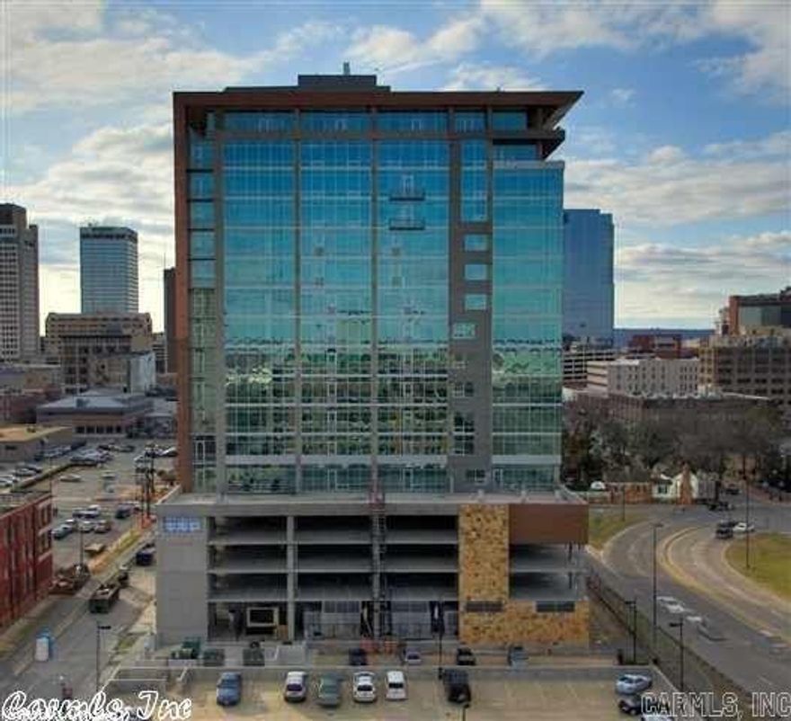 Stunning condo that provides the ultimate setting for Downtown living! Fantastic 2 bedrooms, 2 full baths. Luxury kitchen with beautiful granite counters. Wonderful floor plan with exceptional craftsmanship. Spectacular city views from wall of windows provide sophisticated urban vibe. Updates include, Beautiful Brazilian floors, electrical, paint, lighting, & automated window shade system. Large separate laundry with cabinets made for full sized W/D. Upscale finish outs throughout. Possible lease purchase.