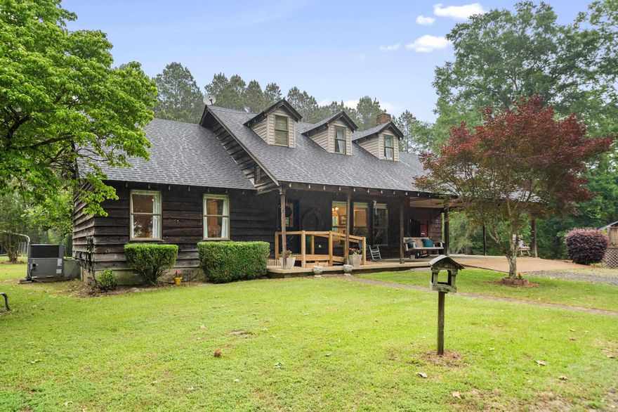 Discover a unique opportunity with this exceptional "two for one" property offering. Encompassing approximately 29 acres of lush, mature trees that welcomes you along a tranquil road, leading to a stunning homestead nestled on a spacious cleared acre. This setting ensures both privacy and serenity, making it the perfect retreat from the bustle of everyday life & magical entertaining. One owner home was designed with convenience and comfort in mind, boasting abundant storage options both inside and outside, extremely oversized primary bedroom (or game room), walk through mud room. Etc.  Upstairs 2024 remodeled, various upgrades downstairs such as granites on all cabinet tops, flooring, 2026 new roof and more noted in Seller’s Questionaries & Seller’s Overview-see documents attached and Agent Remarks.  NOTE: Pictures taken during rainy weather conditions.