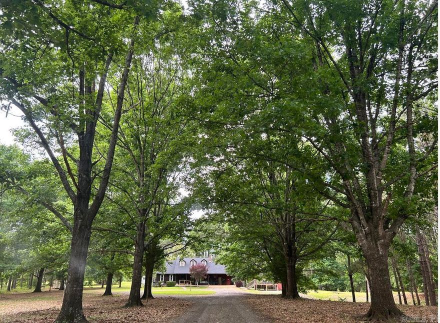 Discover a unique opportunity with this exceptional "two for one" property offering. Encompassing approximately 29 acres of lush, mature trees that welcomes you along a tranquil road, leading to a stunning homestead nestled on a spacious cleared acre. This setting ensures both privacy and serenity, making it the perfect retreat from the bustle of everyday life & magical entertaining. One owner home was designed with convenience and comfort in mind, boasting abundant storage options both inside and outside, extremely oversized primary bedroom (or game room), walk through mud room. Etc.  Upstairs 2024 remodeled, various upgrades downstairs such as granites on all cabinet tops, flooring, 2026 new roof and more noted in Seller’s Questionaries & Seller’s Overview-see documents attached and Agent Remarks.  NOTE: Pictures taken during rainy weather conditions.
