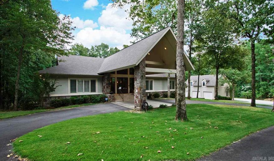 Spectacular architecture located on one of the largest golf course lots in Chenal! Blt by Jack Hartsell this custom designed hm features every amenity. Handsome portico and foyer welcomes you into spacious home w/ limestone and hrdwd floors. 3 fireplaces. Wonderful stonework & vaulted ceilings. Phenomenal chef's kit w/ breakfast room and veranda overlooks magnificent resort styled pool and Private grounds. Master and guest main. Carriage house(sf not incl.)has large living w/ bed & bath+1/2. 4 car gar+golf