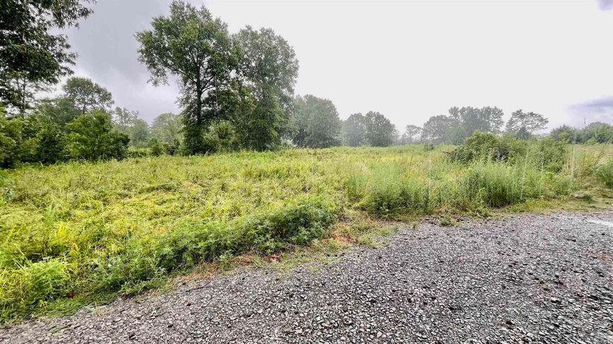 Nice level 5.13 acres+/- lot with no restrictions. This property is in a great spot to build your dream home.
