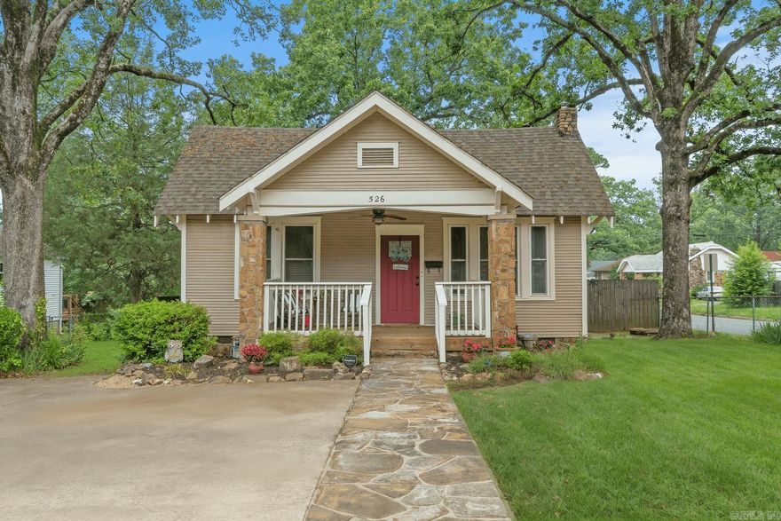 Charming Craftsman in the Heart of Hillcrest! Welcome to this beautifully maintained Craftsman-style home in the desirable Hillcrest neighborhood! Offering 1,796 sq. ft. of living space plus a 234 sq. ft. loft, this 3-bedroom, 2-bath home perfectly combines timeless character with modern updates. Step onto the spacious covered front porch and into a warm and inviting living room featuring a cozy wood stove. The primary suite is a true retreat, with vaulted ceilings, generous natural light, a private covered deck, and an upstairs loft—ideal for a home office, reading nook, or creative space. Additional highlights include a separate dining room, laundry room, and a fully fenced backyard with a storage building—perfect for pets, gardening, or outdoor gatherings. Don’t miss this rare opportunity to own a piece of Hillcrest charm. Schedule your showing today!