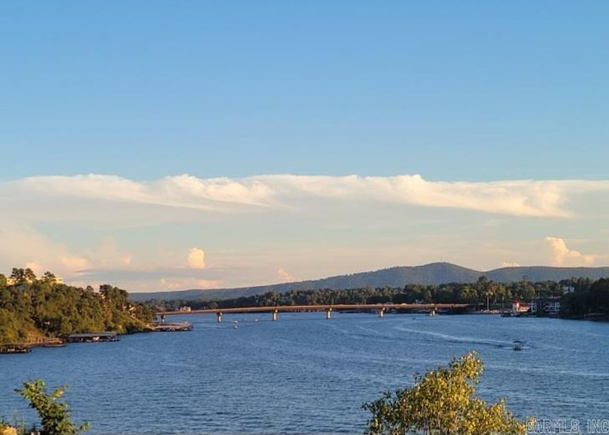 A stunning lake lot awaits you on the shores of Lake Hamilton offering breathtaking panoramic views of the lake and surrounding mountains.  With ample frontage, this lot has enough space for a double boat dock, making it the perfect place for boating and water activities.  Don't miss the opportunity to own this prime piece of real estate and start creating memories that will last a lifetime.