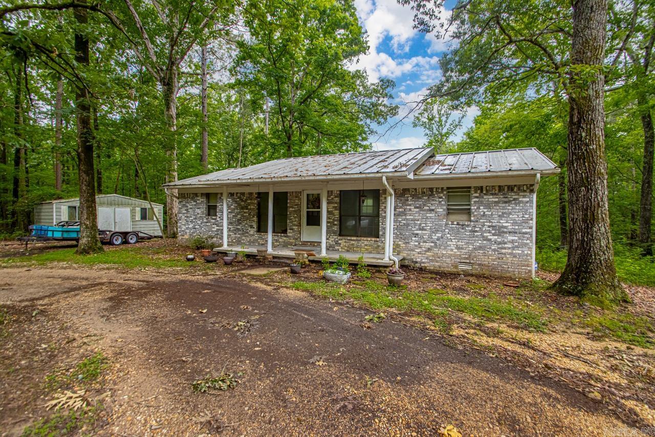 Tucked away at the end of a quiet dead-end street, just outside of town, this adorable four bedroom, two bath home offers the perfect blend of privacy, comfort and convenience. Sitting on five acres, the property provides so many possibilities! Located in a highly sought-after school district, this property sits on five beautiful acres with a fenced-in backyard, perfect for kids, pets and entertaining! Step inside to find a cozy home with newer heating and air units as well as a newer roof! This home received new heating and air units as of July 2023. The 24 gauge high rib metal roof was installed in 2021. The bedroom addition was completed in February of 2025. This house comes with a storage shed, a swing set and a circle driveway, offering plenty of parking! The kitchen comes fully equipped with a refrigerator, microwave, dishwasher, and even a washer and dryer - everything you need to move right in! Don't miss your chance to own this serene and functional property that offers space, comfort, and value!