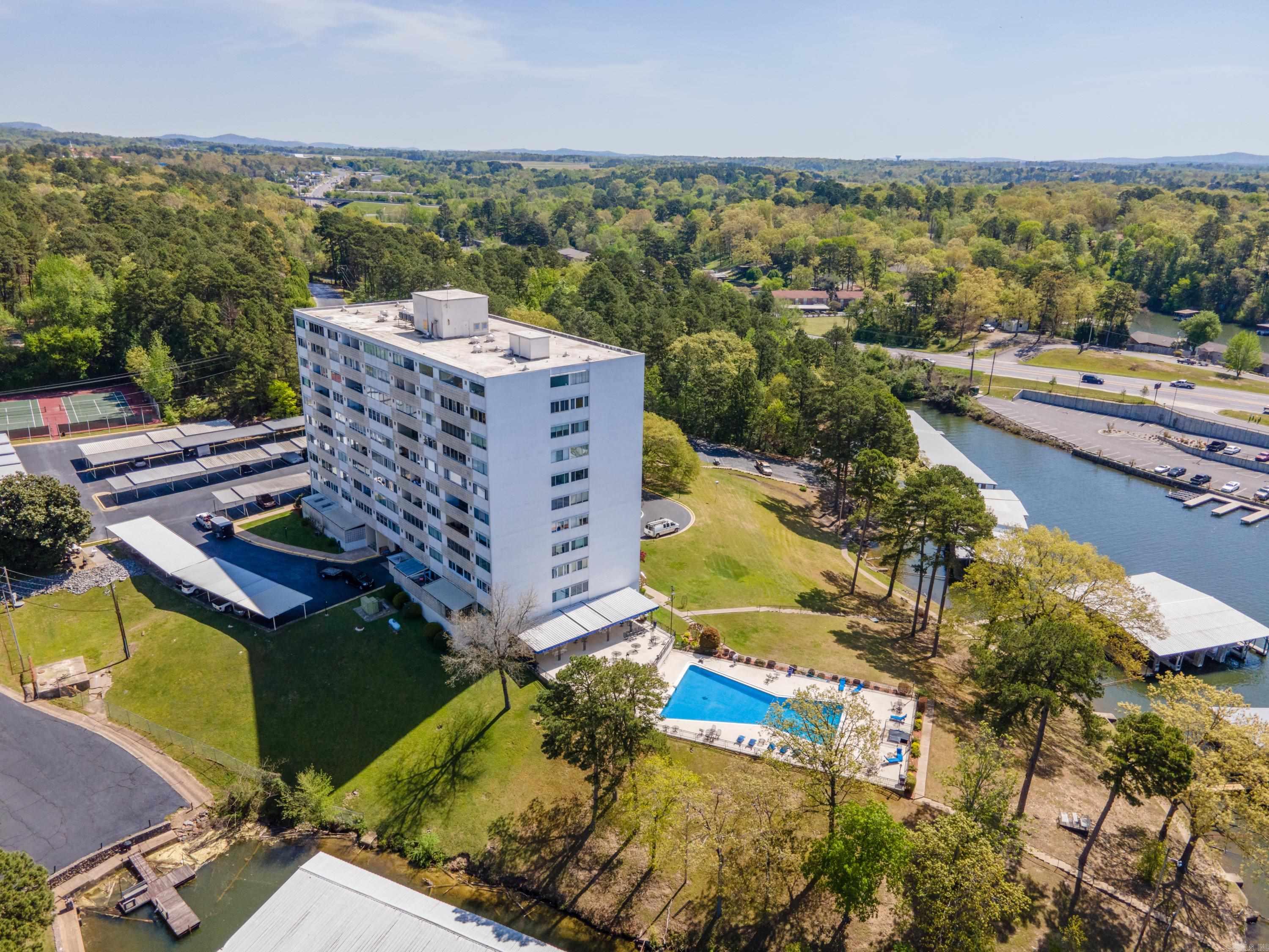 BOAT SLIP AND COVERED PARKING! Welcome to your perfect lakefront escape! This beautifully remodeled 1 bedroom, 1 bath condo at Beacon Manor on beautiful Lake Hamilton is an active Airbnb, offered fully furnished and rental ready. Enjoy peaceful water views,modern comforts, and a strong rental history all just minutes from the heart of Hot Springs. Updated in 2021, and a new HVAC system was installed in 2020. This unit comes with a boat slip and covered parking, making it ideal for both vacationers and full-time residents.Beacon Manor also offers gated entry, a pool, fitness center, and direct lake access.