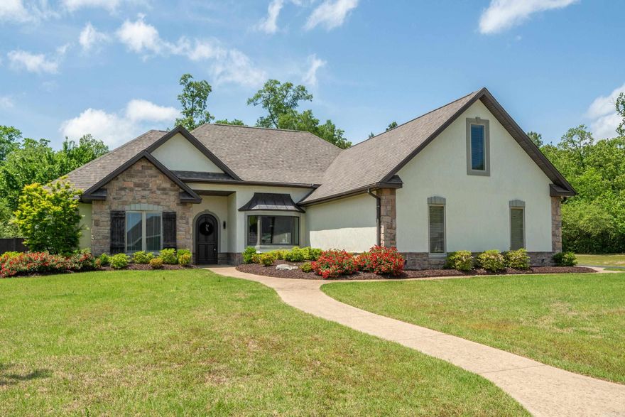 Stunning Custom Built 5 Bedroom 3 1/2 Bath Home in Gated Hunters Cove Phase III Subdivision - just off of Lake Hamilton. Beautiful Craftmanship await you throughout the open living & dining area. The kitchen boasts high end appliances, generous storage, and sleek countertops, making meal preparation a joy. Escape to the spacious primary suite which has two large walk-in closets, and custom finishes. Downstairs has two large guest bedrooms with Jack-N-Jill bathroom. A convenient half bath is located in the hall. Upstairs you will discover the Theater Room/Bonus Room, plus playroom/Extra living room two additional guest bedrooms with a full bathroom. Outside the home features include a quiet covered patio for entertaining, large fenced yard, beautiful landscaping, community boat storage lot, boat launch ramp and pavilion. Roof was replaced in 2024. For appointment, please contact Wayne Post, 501-454-8263