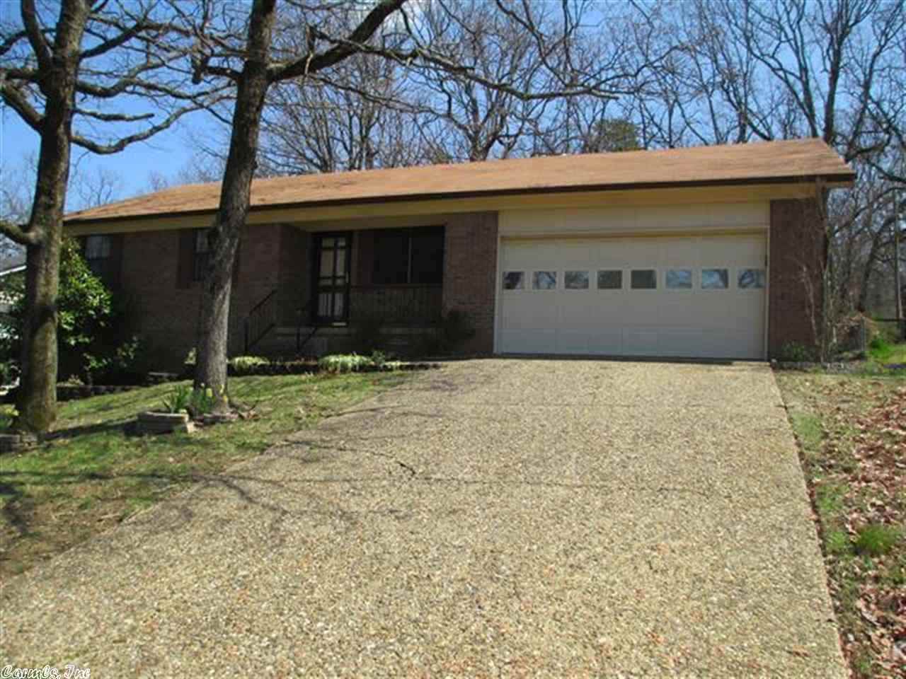 Inspection issue is fixed and we are ready for you call this home!! One level home with large den that has two skylights and a great fireplace. The eat in kitchen has granite countertops and porcelain backsplash, new garbage disposal and newer stainless vent-a-hood. There is laminate or vinyl throughout the home. The roof was replaced in 2010. This home is clean as a pin AND there is a great work shop, plus a storage building in the wonderful shaded back yard! New HW heater '14!