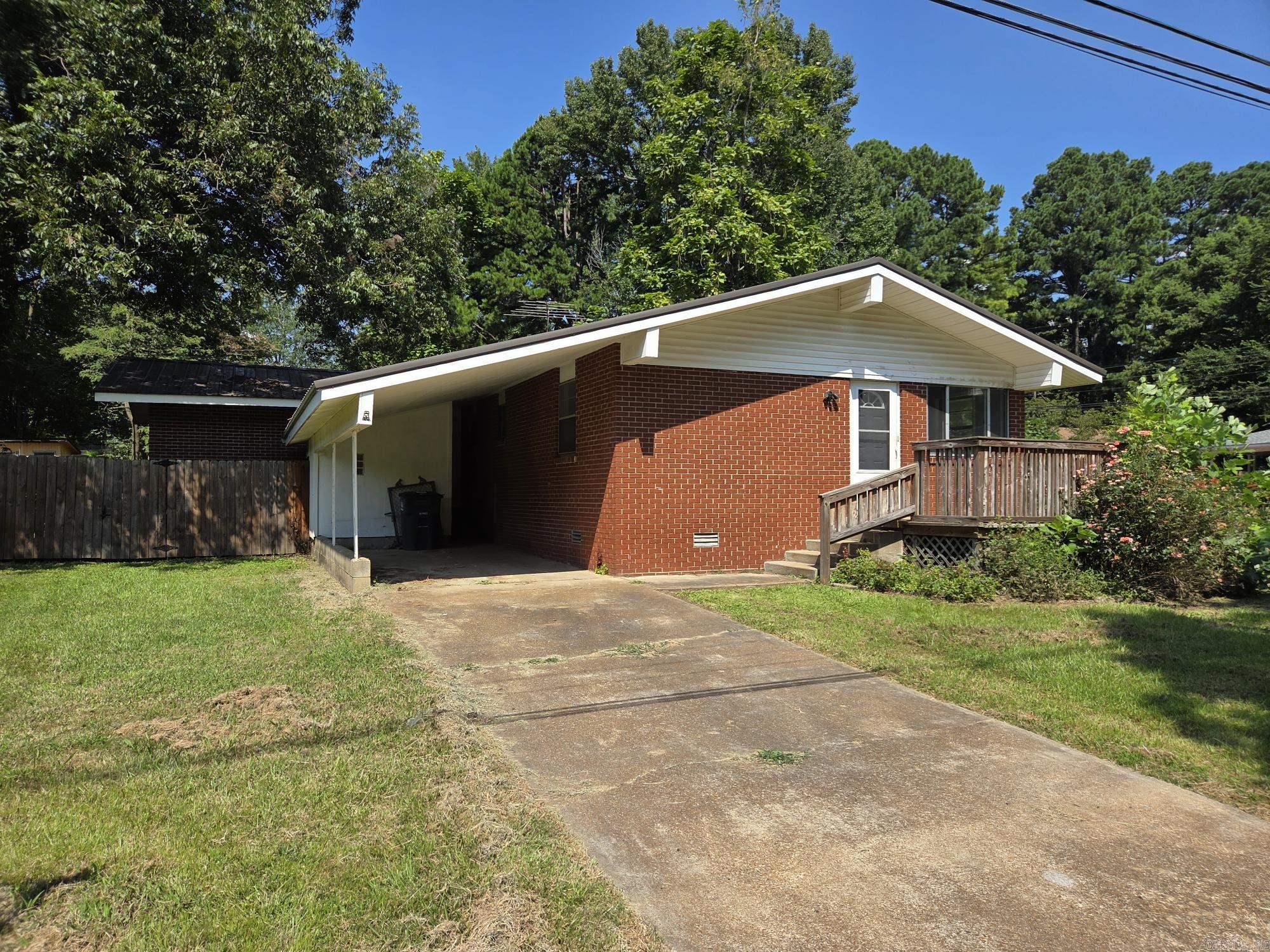 All electric 4 bedroom, 2 1/2 bath house with lots of space for large family or extended family. The house has a metal roof that was installed about 8 years ago per seller, fenced in back yard with a storage building in the back. A double gate faces the side on Adkins to access backyard with a trailer or boat. The NEW HVAC has recently installed, spacious suit with bath & walk-in closet with exterior access to the carport. See agent remarks.