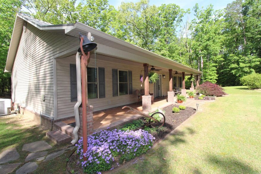 Custom home on 5 wooded acres*the 30x50 shop is tall enough for your RV*a second 24x30 shop that is being used for the garage*home is well insulated with Pella windows, 16 seer HVAC, foam insulated walls and ceilings, and an on-demand water heater*low utilities, gas avg $24 a month and electric is $150 a month*tons of cabinets, drawers, counter space and ample pantry space*all kitchen appliances stay and are Frigidaire Professional Series*both TV's stay*interior freshly painted last year*long lasting metal roof on home*security system*nice chicken coop with two sections (chickens can stay)*super cute screened-in deck with patio, swing and firepit*paved drive*extra landscaping*wired for a generator*this home is in immaculate shape and looks brand new*