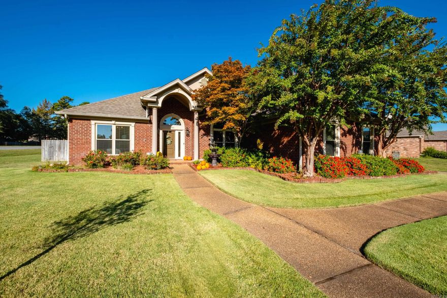 Beautiful & immaculate home in a great neighborhood on Lake Willastein!  A short distance to the pathways, park, fishing piers & more!  This home is on a level corner lot - gorgeous landscaping front & back & sprinkler system w/ sep meter.  Side loading garages & a privacy fenced backyard with a covered patio area, deck added in 2022 plus a covered grill area to use all year around.  Inside features beautiful newer hardwoods in the living/dining & hallways, tall ceilings, double sided fireplace (gas logs added 2017) between the living & hearth room which has built-ins.  The kitchen has updated quartz counters & subway tile backslash, gas cooktop & updated ice maker. Primary BR is apart with newer carpet, 2 separate closets & bathroom with updated vanity areas & light fixtures.  Guest BRs (1 has newer carpet) share a hall bath that also connects to half bath making it very functional.  Central vacuum system. Entire HVAC system was replaced in 2023.  Windows replaced in 2018.  Roof being replaced this month!   AGENTS - see remarks regarding possession.