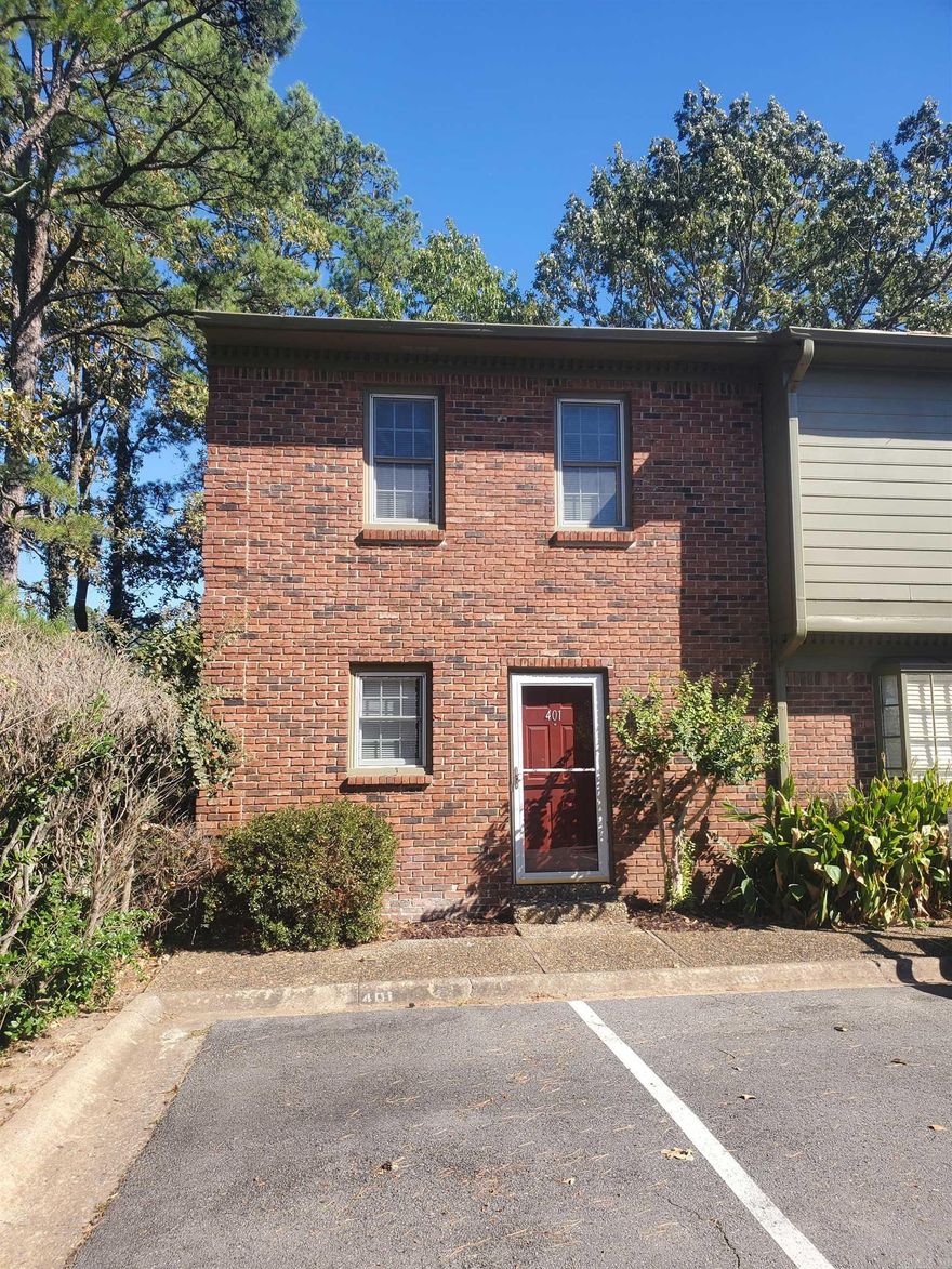 Adorable Georgian brick West Little Rock townhome in secluded small town home community with updates and conveniently located near shopping, interstate and schools. Open great room and dining area w/ fireplace, built in shelves, cozy kitchen w/ refrigerator, laundry with washer & dryer and half bath for guest. Bright and airy corner end unit with green space, private patio with pvc fence & (2) assigned parking areas for homeowners. Spacious rooms, laminate wood floors and ample closet space w/ walk-in closets and outdoor storage. POA responsible for water, garbage, termite and exterior of townhome. POA fee more reasonable than most in WLR. Guest parking available and home owner has (2) assigned parking spots w/ guest parking & mailbox area steps away from your front door. Don't pay more for renting when mortgage rates are going down making this townhome more reasonable than renting. Make an appointment to view today! Realtors, see agent remarks and the homestead credit ($425.00) has not been applied to taxes.
