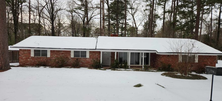 Nice house located in Suburbia Subdivision. Newly painted, updated kitchen, nice size shop.