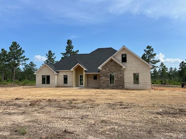 NEW SUBDIVISION IN EAST END COMMUNITY!!! Drake Trail Estates.....Are you looking for easy access to the freeway? Only 20 min to downtown Little Rock. This is a perfect location and great school district as well as community. This home features 4 main bedrooms downstairs, one could be an office. Bonus room upstairs with a nice closet or could be used as a 5th bedroom if needed. No carpet. As you walk into the entry way you are greeted with an open area showing off a beautiful gas log fireplace, open to large customized kitchen, lots of cabinets and huge walk in pantry. The kitchen has a gas stove with wall microwave and oven. Stainless steel appliances. Quartz countertops and custom painted cabinets. The primary bedroom is split plan from other rooms. The primary bathroom is large with a custom tile shower, separate vanities, soak tub. The primary closet is huge with lots of built in dresser space. Exterior is all brick with a small amount of hardie board to give the perfect curb appeal. The front porch is perfect for those rocking chairs and the covered back porch will be great for grilling out with a super large yard. Plenty of space for that shop and pool to be added.