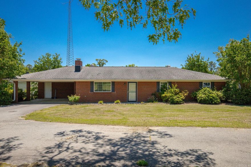 If you've been looking for a house with a large shop and acreage, look no further! This 3 bed 2 bath home sits on approximately 4.2 acres and has TWO shops!  Inside, enjoy a wood burning stove, an updated kitchen, extra large laundry room, and a heated and cooled enclosed sunroom.   Outside, you'll love the circle driveway, a 30x30 shop, and a huge 50x50 shop with plumbing and large bay doors that will fit large trucks. Schedule your showing today!