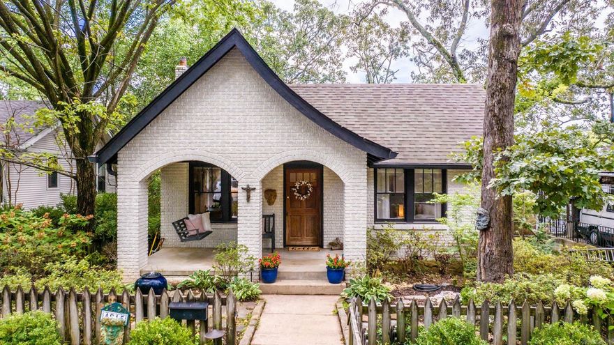 This is a charming 2 bed/2 bath in the heart of Hillcrest.   Out front you’re greeted with your large front porch with the cozy porch swing and great custom landscaping. You’re welcomed inside into your spacious living with large windows, giving a ton of natural light.   Continue into your dining with built in shelving that opens nicely into your kitchen with the large pantry and fridge that can stay.  Privately set apart down the hall is your oversized primary suite with the walk in closet and attached full bath.   Down the hallway to the right you’ll find your guest bed and guest bath.   Take the stairs to find your walk out basement, great for storage or a workout room as well as a heated and cooled office space / man cave!   Out back you’ll find your deck, fire pit, and large shade trees to enjoy some nice privacy outdoors.   We can’t wait for you to come and see if it’s yours.