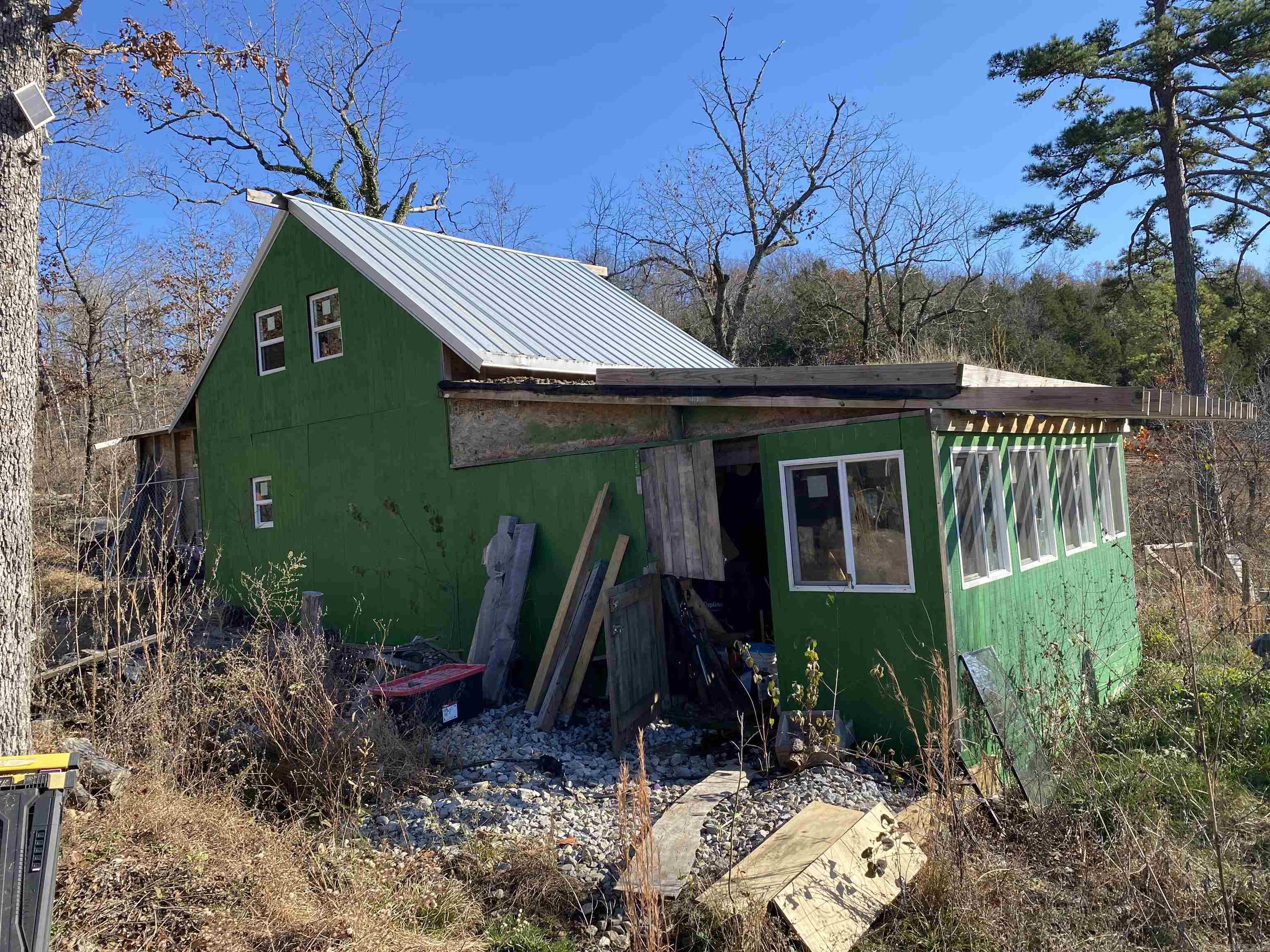 Are you looking for your very own Ozark hillside retreat? This 38AC M/L is located in Rea Valley, AR surrounded by the beautiful Ozark mountains with its own private well, electricity, fiber internet. and a neat little woodworking shop loaded with tools that's ready to be finished the way you like! A natural spring runs year round and the property sports multiple building sites and has trails cut throughout, making ATV travel extremely easy.
