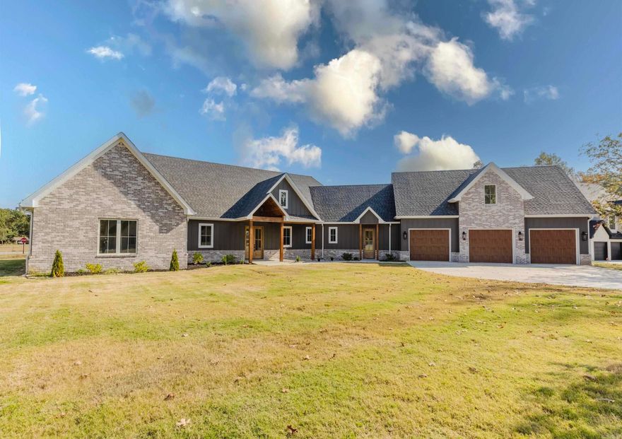 Welcome to this stunning new construction home in Hazel Oak of Benton! You will appreciate the acreage lot and everything this expansive home has to offer. The builder has thought of everything for this home, with features that include: wood floors and stairs, wooden beams, huge bonus room, tongue and groove work, sonos surround system, brick and custom accent walls, spray foam insulation, and an alarm system. The kitchen is a chef's dream with double ovens, ice-maker, custom cabinetry, a hidden pantry, and a large island. The special touches extend to the outside as well, with a large covered patio featuring a fireplace, irrigation system, and plenty of parking. This 4-bedroom, 3.5-bathroom home has everything needed for family entertaining. Welcome home!