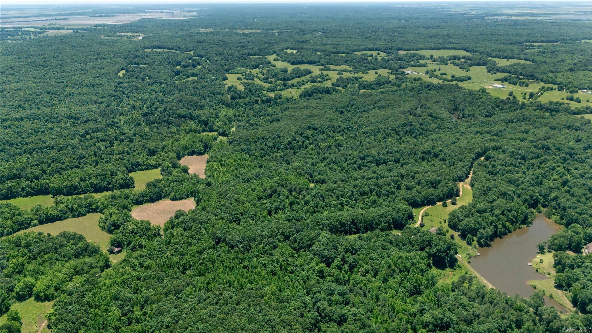 Welcome to 29.36 Acres County Road 303 in Cherry Valley, Arkansas! This 29.36 acre tract of wooded land offers a rare opportunity for recreation, building, or investment. With county road frontage and access to a pond, this property combines natural beauty with accessibility. The land is heavily wooded, making it ideal for hunting, trail riding, or creating your own private getaway. Utilities are available nearby but are not currently on the property, giving you flexibility to develop it your way. Enjoy the peaceful, rural setting while still being close to town conveniences. Whether you're looking to build a home, set up a hunting retreat, or simply secure a slice of the countryside, this property has endless potential. No physical address assigned; listed as 29.36 Acres County Road 303 Cherry Valley, AR 72324. Don't miss your chance to own a beautiful piece of Arkansas land. Call today to learn more or schedule a walk of the property!