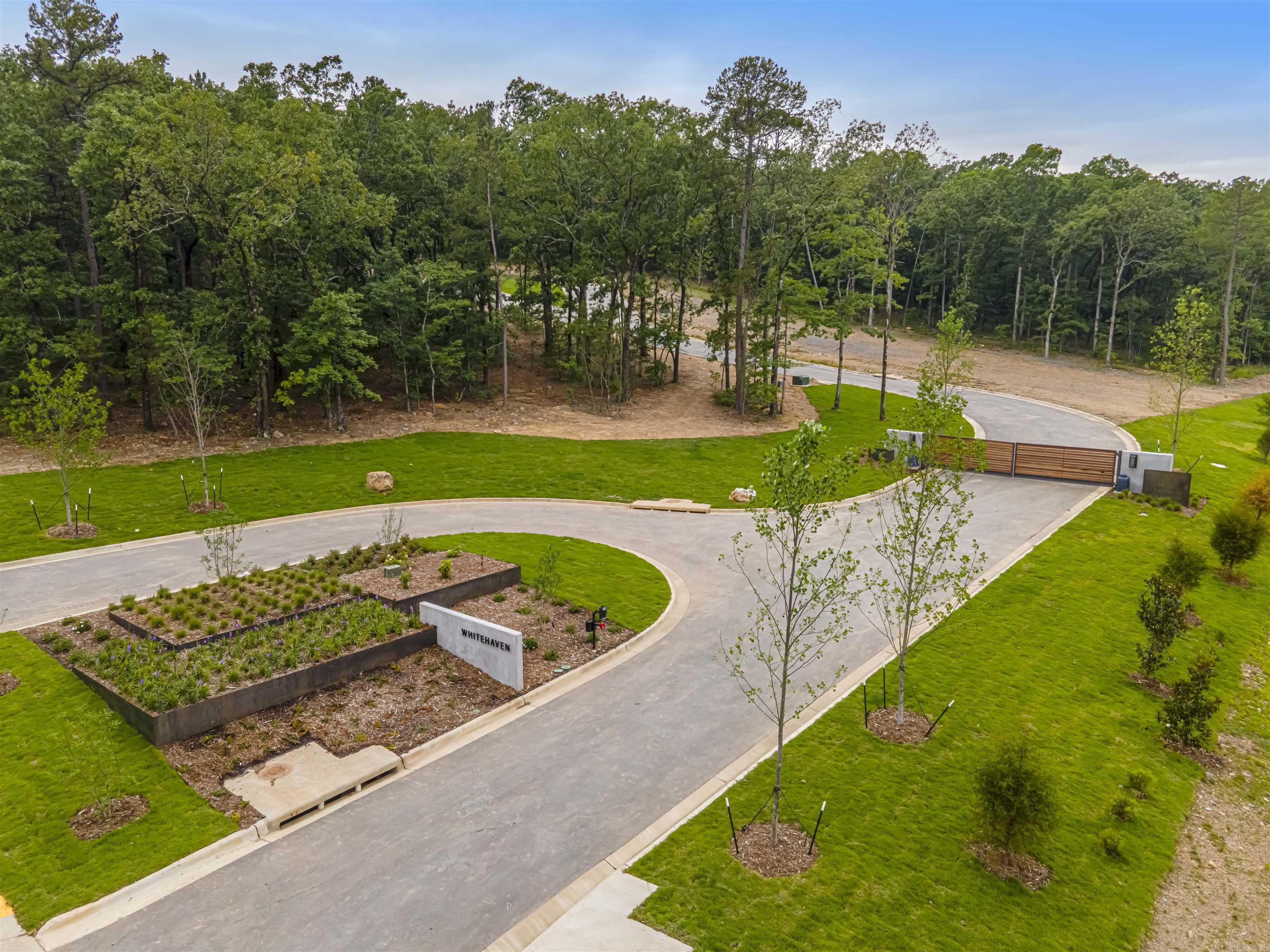 Come build your dream home in this beautiful new subdivision. Whitehaven will have a modern aesthetic feel and only consist of 4 homes in a gated neighborhood. All lots are larger than 1.2 acres, zoned for Don Roberts elementary, and have a beautiful view of Pinnacle Mountain. Located off of LaMarche Drive and minutes from the Promenade along with other popular shops and restaurants. Don't miss out on this rare location and schedule your showing today. Agents, Bill of Assurance, and survey in Documents.